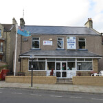 Front View of finished roof Front View of finished roof